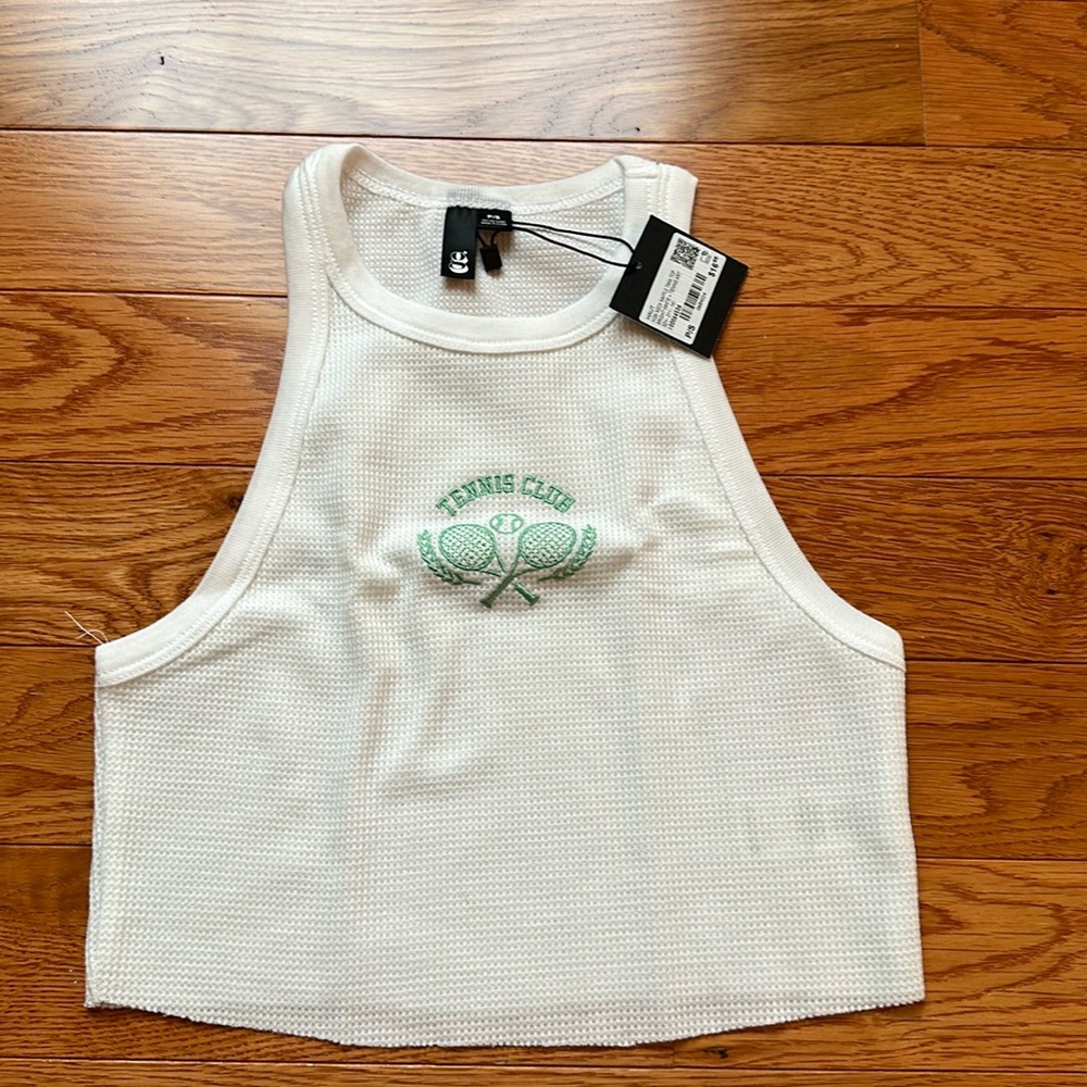Small, white tank top.